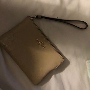 Tan patent leather coach wristlet